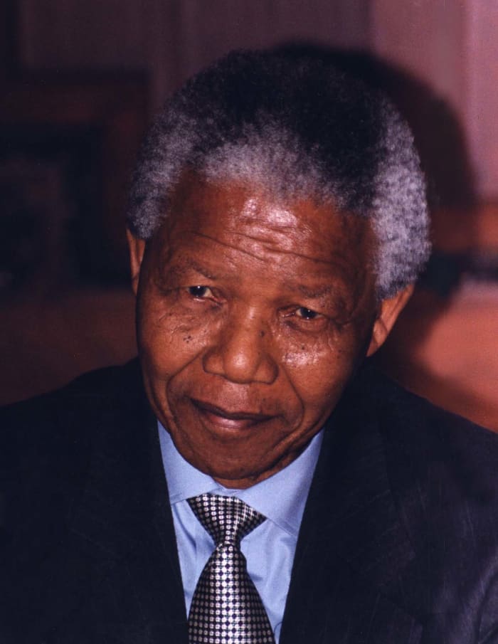 After serving 27 years in prison for opposing apartheid, revolutionary and activitist Nelson Mandela became South Africa's first Black democratically elected president.