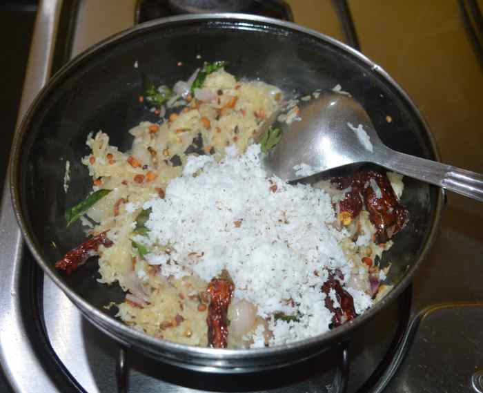 Add grated coconut and mix well.