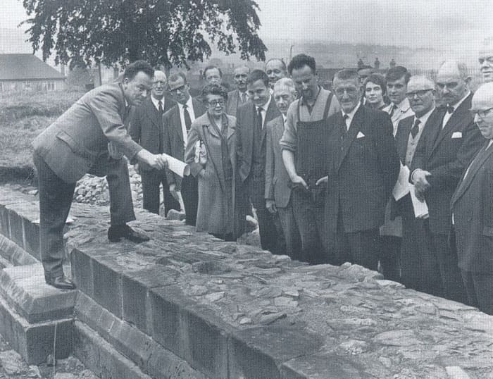 Touring the site of Hulton Abbey back in 1966, the Stoke-on-Trent City Council Excavation Committee studies the remains of the medieval church walls that can still be seen today.