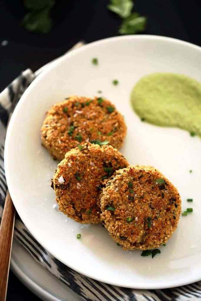Quinoa-cauliflower cakes with herbed Brazil nut cream