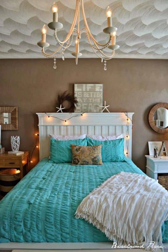 Keep an ocean or water theme in the bedroom. Chandeliers and mirrors are fantastic touches for Pisces vibes.