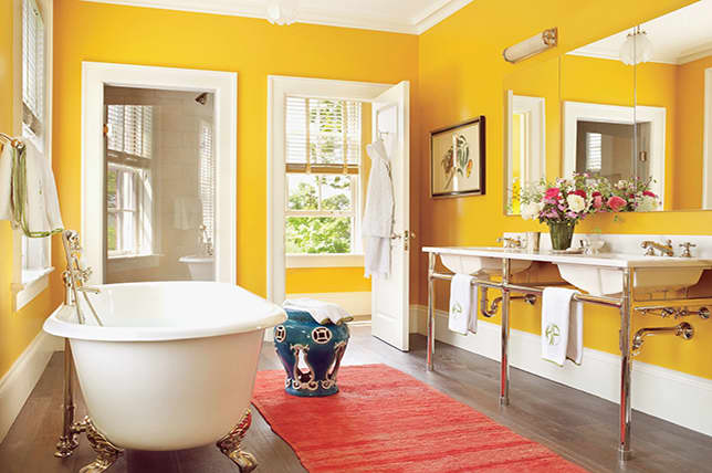 A yellow bathroom is perfect for Gemini. Throw in some flowers and two sinks, and it'll feel like home.