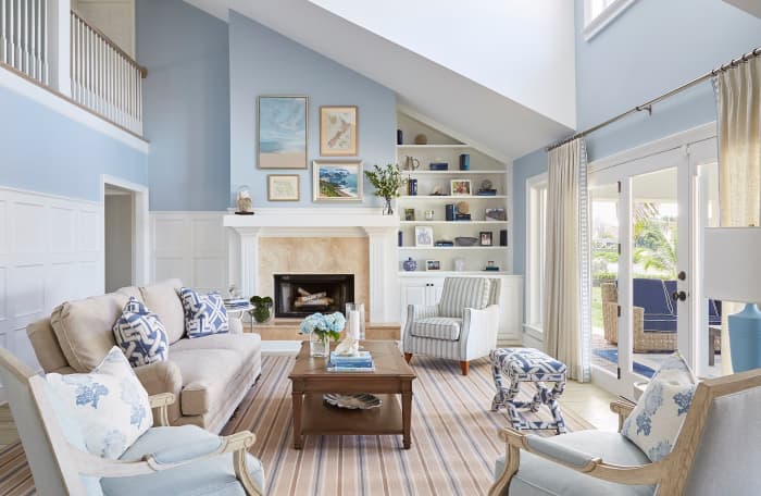 The Cancer living room should have beach house vibes. Paint the walls in a light or medium blue shade.