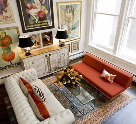 A Libra living room is about decorating all the wall space and not making furniture too matchy-matchy.