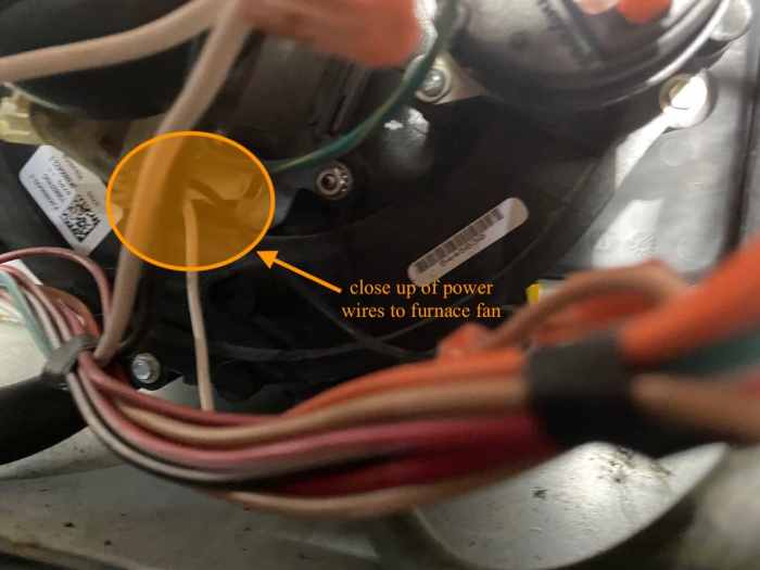 Close up of power wires feeing the fan motor