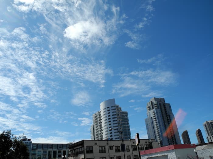 Buildings surrounded by this Baking Soda Consistency Cloud Formation from the Fall Out of Chemtrails.