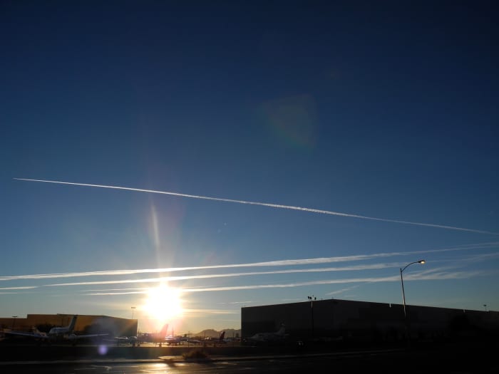 Another angle of the initial Pencil Thin Type lines that you see when the planes spray the Aerosol jet spray Chemtrails. Glistening like a Spider Web in the Sun.