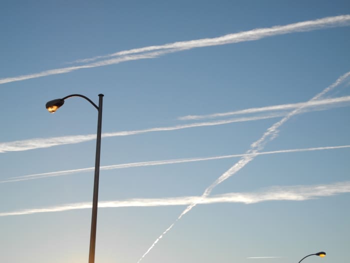 (Phase 2) The Pencil Thin Lines begin to morph quickly into wider streams of Chemtrails... similar to how one of those thin sponges starts expanding when exposed to water... it continues to grow- and morph into a much LARGER Cloud Formation.