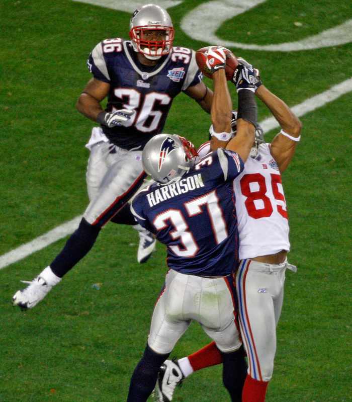 David Tyree catches the football with his helmet in one of the most clutch plays in Super Bowl history.