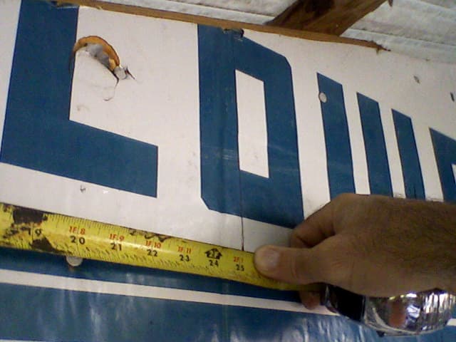 Measure the distance from the eave line to the place where you measured the "rise." This is the "run."