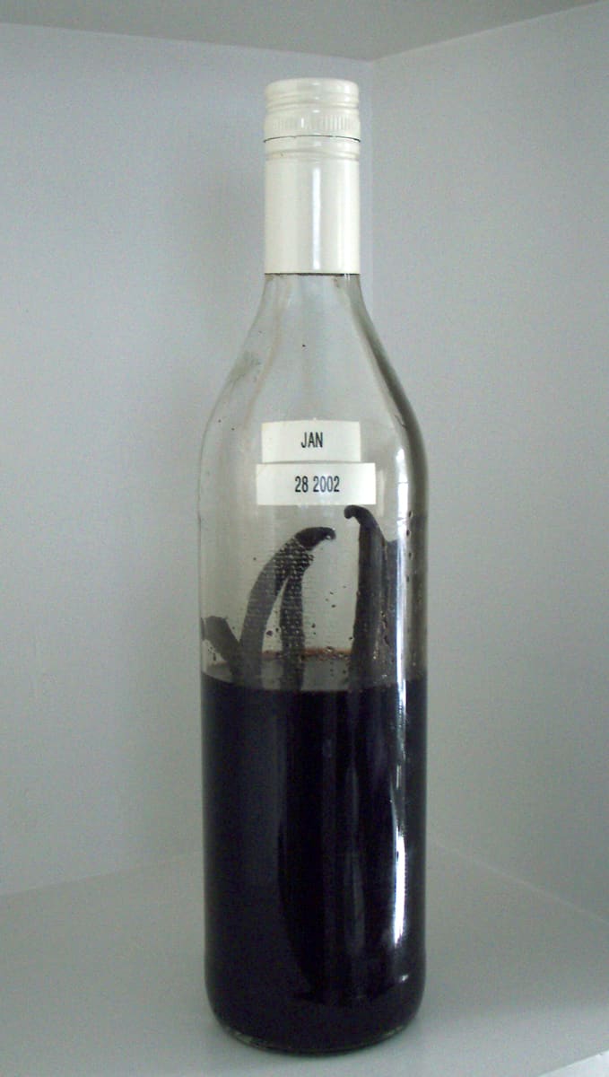 I used an old screw top bottle. Any jar will do nicely as long as the cap stays snug. You'll want to occasionally shake the vanilla extract.