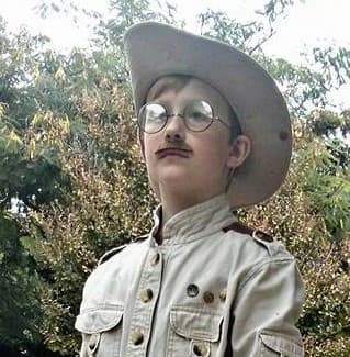 Shaunna tells how this costume came together: "He had the khakis and I found a jacket at a thrift store, that I embellished with buttons and brown felt." Outfit for son, Henry.