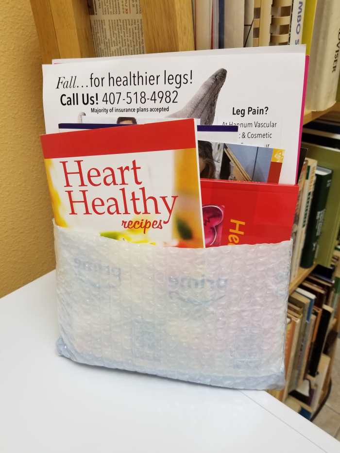 I turn the bag inside out and cut off the top half. It works great to store recipe booklets or health info, etc.