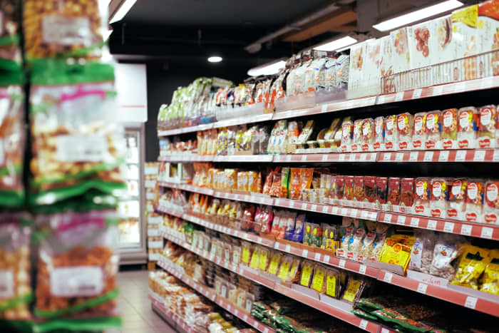 Make roaming the supermarket aisles more fun with your child by engaging him in shopping. He will learn how to get the most for his money and hone his math skills. Photo by Mehrad Vosoughi from Pexels