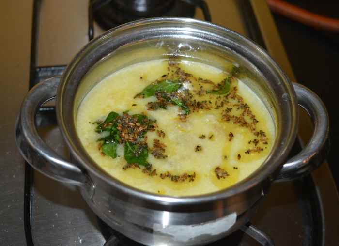 Add the tempering to the curry as per instructions.