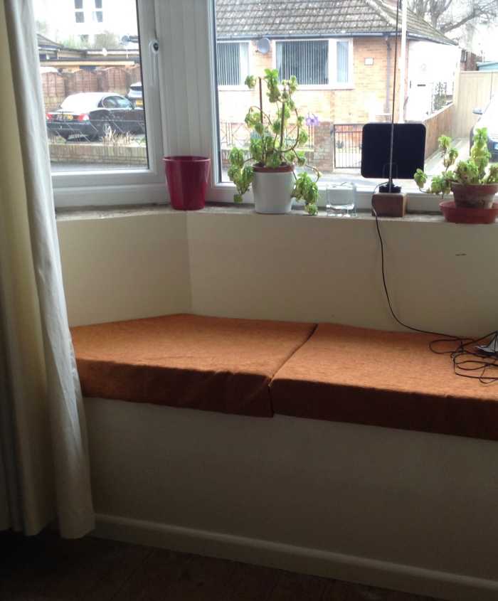 Window Seat - the grandchildren can hide behind the curtains & store their toys underneath!