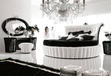 The Chinese Zodiac Rat's bedroom should play off contrasts rather than colors. The rat needs a place to hide, to meditate, and to protect itself. Opt for round furniture, even a round mattress. I prefer a white comforter over a black one.