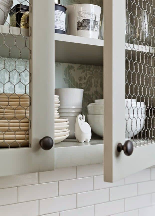 How to put chicken wire in a cabinet door. Chicken wire fronts on kitchen cabinets. Use the claw to remove the panel of the cabinet door from the frame.