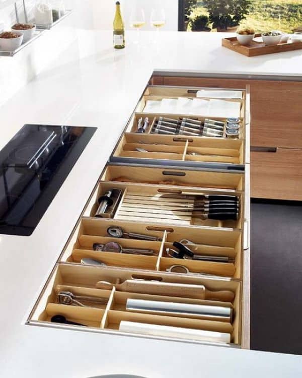Neat organized kitchen drawers for knives, spoons and other similar utensils. The drawer organizers are definitely with that.