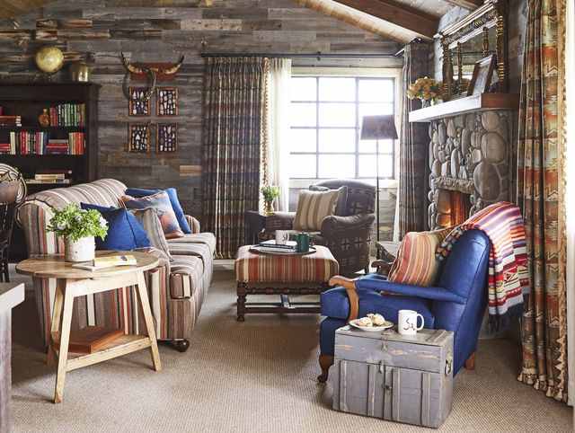 The Ox living room would look nice with stone elements and touches of blue. Leather looks great in an Ox home.