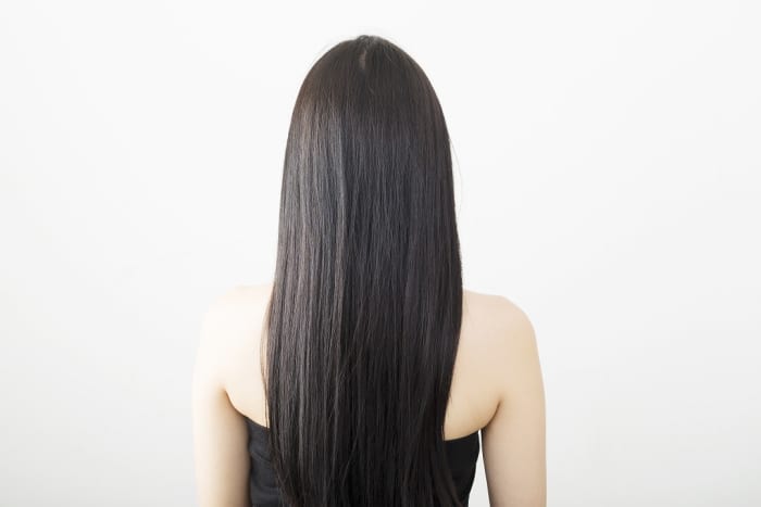 Natural black is the standard black shade. It doesn't have any particular tone to it but it's pitch black in color.