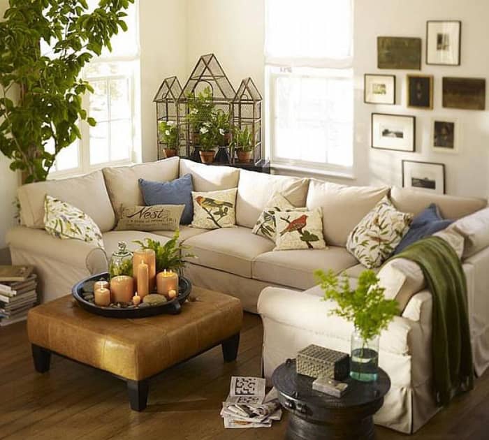 The Tiger living room should feel busy. There should be lots of patterns. A mix of white and green. Wooden furniture. And a sprawling sofa.
