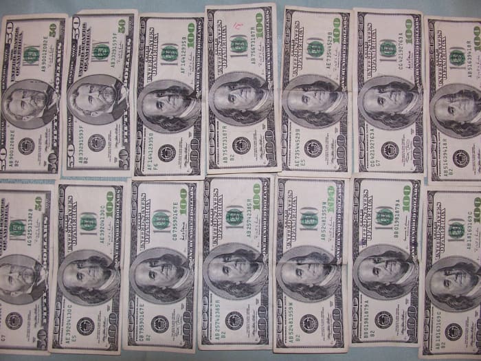 Positions which require working with large amounts of money generally require credit checks AND background checks.