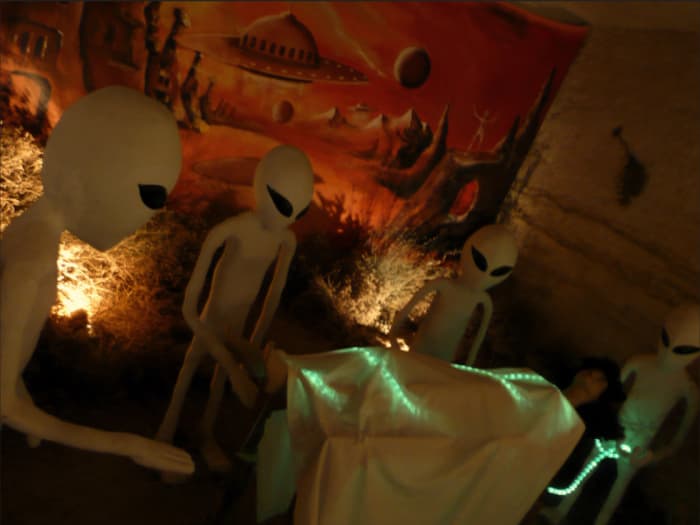 ... the light became a single plasma beam projected onto his chest. He glanced at the two beings: tall, slender, with big heads, three diamond-shaped eyes, and vertical slits for mouths stood over him. One of them held the orb. Originally posted at