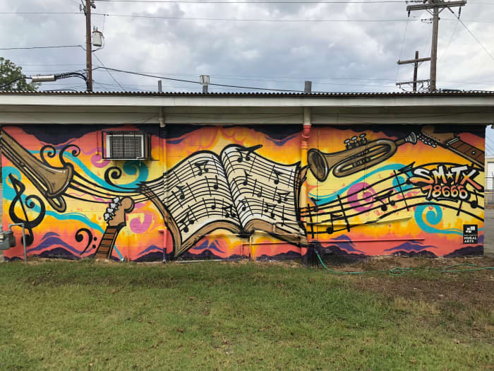 This mural celebrates the life of San Marcos native Eddie Durham, jazz musician and electric guitar pioneer.