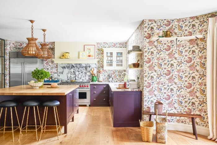 A Rabbit kitchen looks lovely with a combo of pink and black. Add some plants. Floral wallpaper looks nice and spring like.