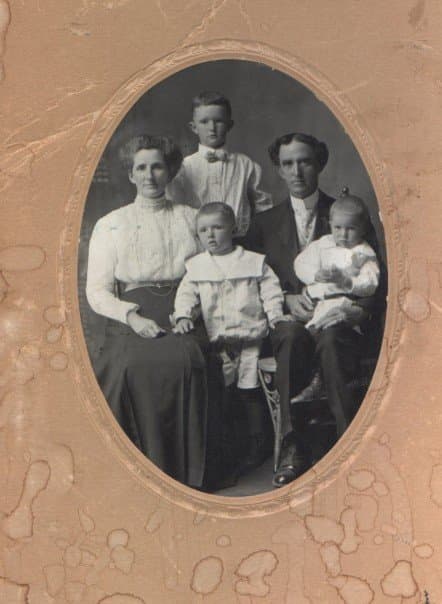 My Great-Grandparents John James Sanders and Catherine Merrick Sanders with my Grandfather William Bertram Sanders, the tall lad between his parents. c. 1908