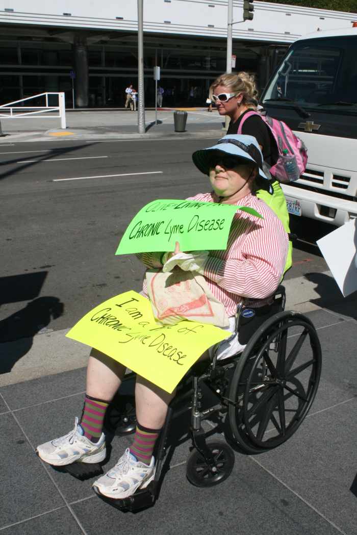 Wheelchair bound Lyme patient rallies outside of Infectious Disease conference asking for revised treatment guidelines. San Francisco, 2013.