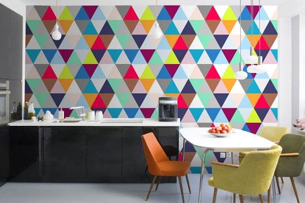 Check out all those triangles. The Snake Zodiac should have stripes in the living room, and triangles in the kitchen. Complement those triangles with the colors black, orange, yellow, red, and green.