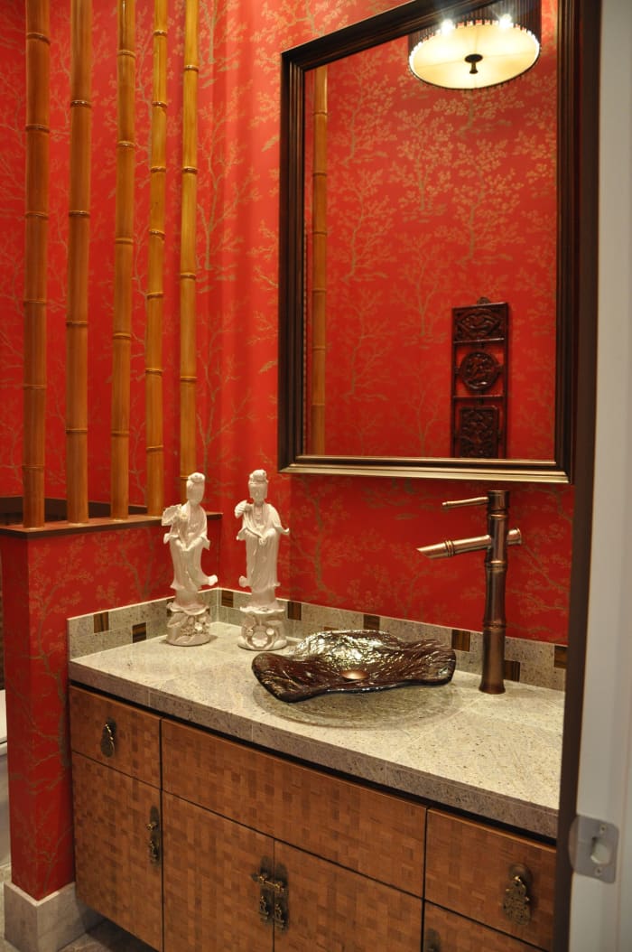 The Snake Zodiac should have a strong color in the bathroom. Red, orange, yellow, or black. Bamboo and pottery-figurines are an excellent idea. Think long, think fire, and think jagged.