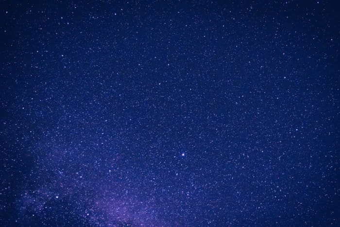 This blue and white starry sky represents a void as the the stars extend for miles on end and it also represents the album's title.