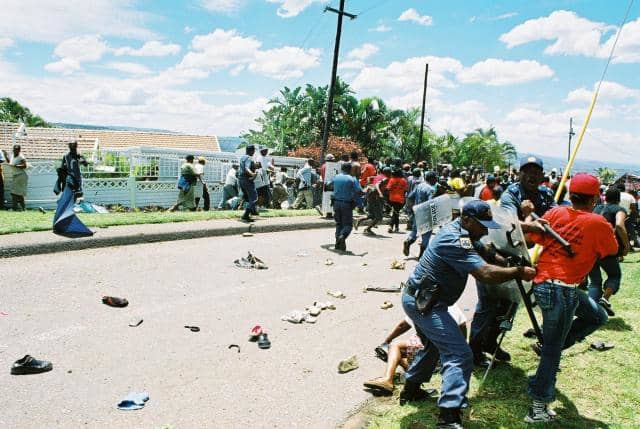 Grave concerns about the Etention without Trial of the Kennedy thrirteen who were arrested in the aftermath of the attact of the Abahlali baseMjondolo, as seen on the photograph in the Kennedy Road Settlement who are demanding equality for all people