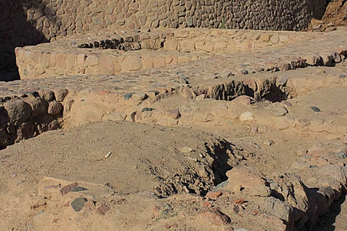 One of the 24 U-shaped towers which fortified the outer defences of the walled city of Ayla can be seen at the top of this photo