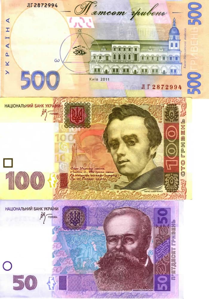 Large Ukrainian bills. Note the varying sizes and colors used in most foreign nations. It contrasts the uniform green and size (2.61x6.14 inches) of U.S. dollars. Note the eye and pyramid on the 500 UAH note.