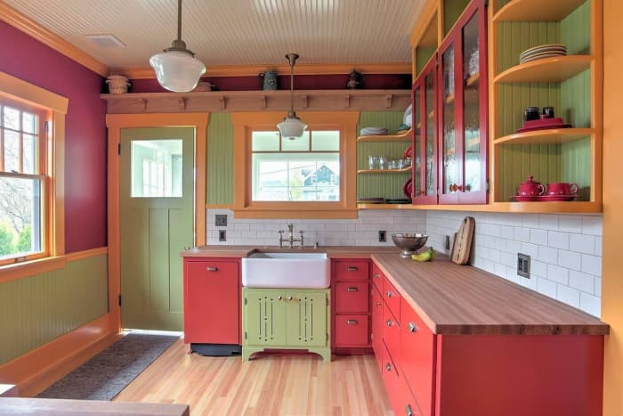 The key word for the Chinese Zodiac Goat in interior design is eclectic. You don't want the same color or pattern broadcast in one room. Try this style of mixing different colors. Green + red = fun.
