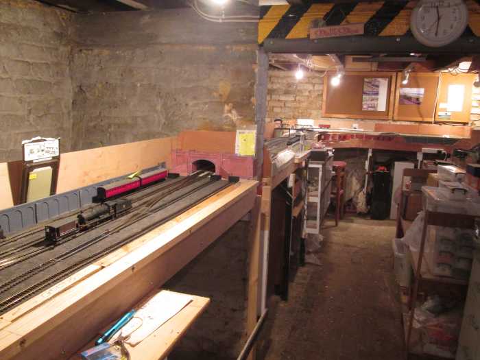 Units 5 back to 4, the view back to Unit 3 and main stock/loco shelving unit J39 64710 propels an ex-Midland brake van on the Up Main