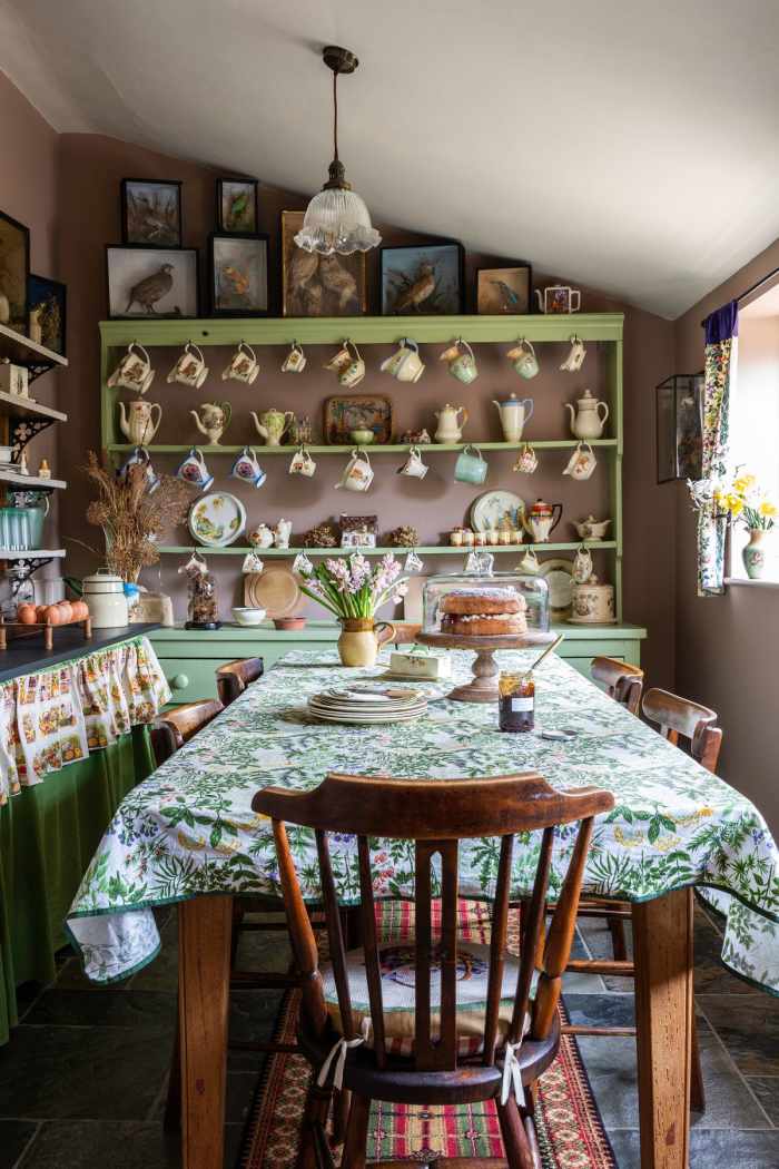 Cottagecore. Become familiar with the word if you want to design your home around the Chinese Zodiac Dog. This kitchen perfectly mixes green and red, by the way.