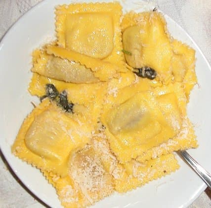 Tortelli with pumpkin stuffing, seasoned with Butter and sage. Tortelli di Zucca con Burro e Salvia. (Emilia Romagna)