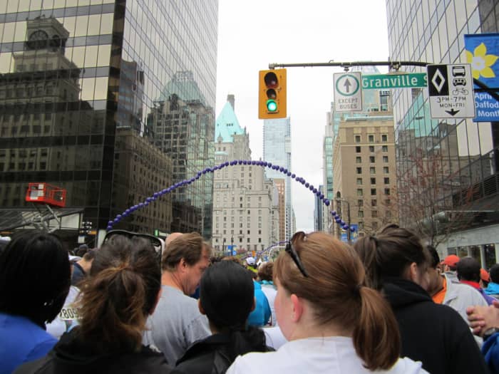 Reflections at the start of the Vancouver Sun Run, with the green roof of the Hotel Vancouver in the background