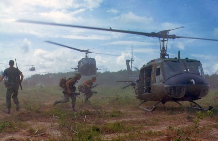American helicopters airlift members of a U.S. infantry regiment in 1966. The war in Vietnam would be the first war where helicopters would become the main source of transportation for combat troops.