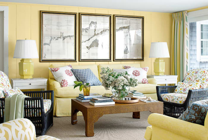 Yellow, brown, and gray make for a lovely living room for the Chinese Zodiac Pig. Those are its favorite colors! They also like lilies, black and white photography, and rounded objects.