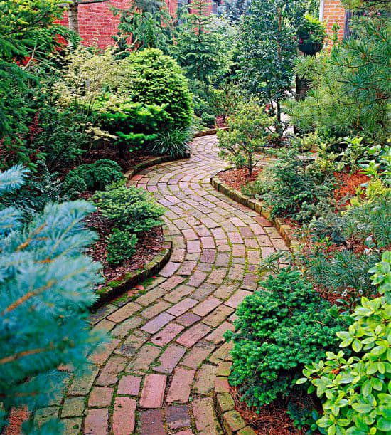 Brick pathways can help make your garden look organized and manicured. The red brick is perfect for an Aries style garden.