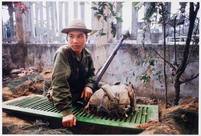 North Vietnamese soldier sitting on top of his foxhole waiting for the U.S. Marines to walk into his ambush.
