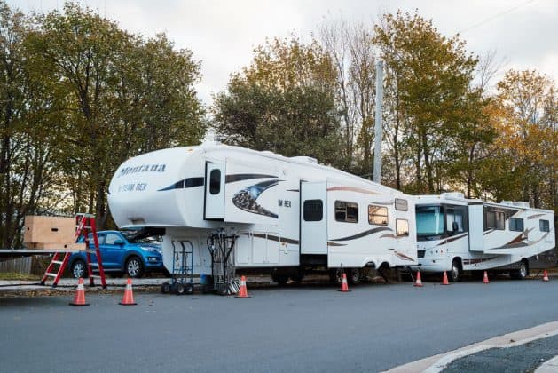 The trailer aka "Team Rex" on location has an office for trainer Sherri Davis and was custom-built for the dogs in the show