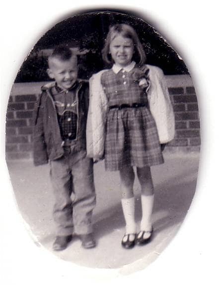 First day of school. That's my brother, Ed, or Eddie, as we used to call him as a child, who is a year younger than I am. I don't look too happy. Apparently, my mother loved plaid dresses. Looks like I am wearing a drooping rose corsage ...