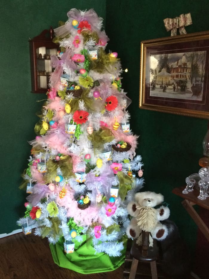 Christmas trees aren't just for Christmas! Add egg ornaments and pastel ribbons, and you've created an Easter tree.